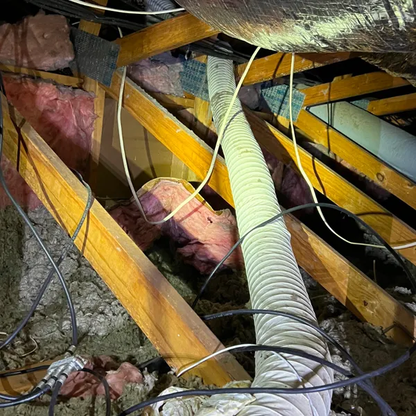 Long stretch of dryer vent through attic