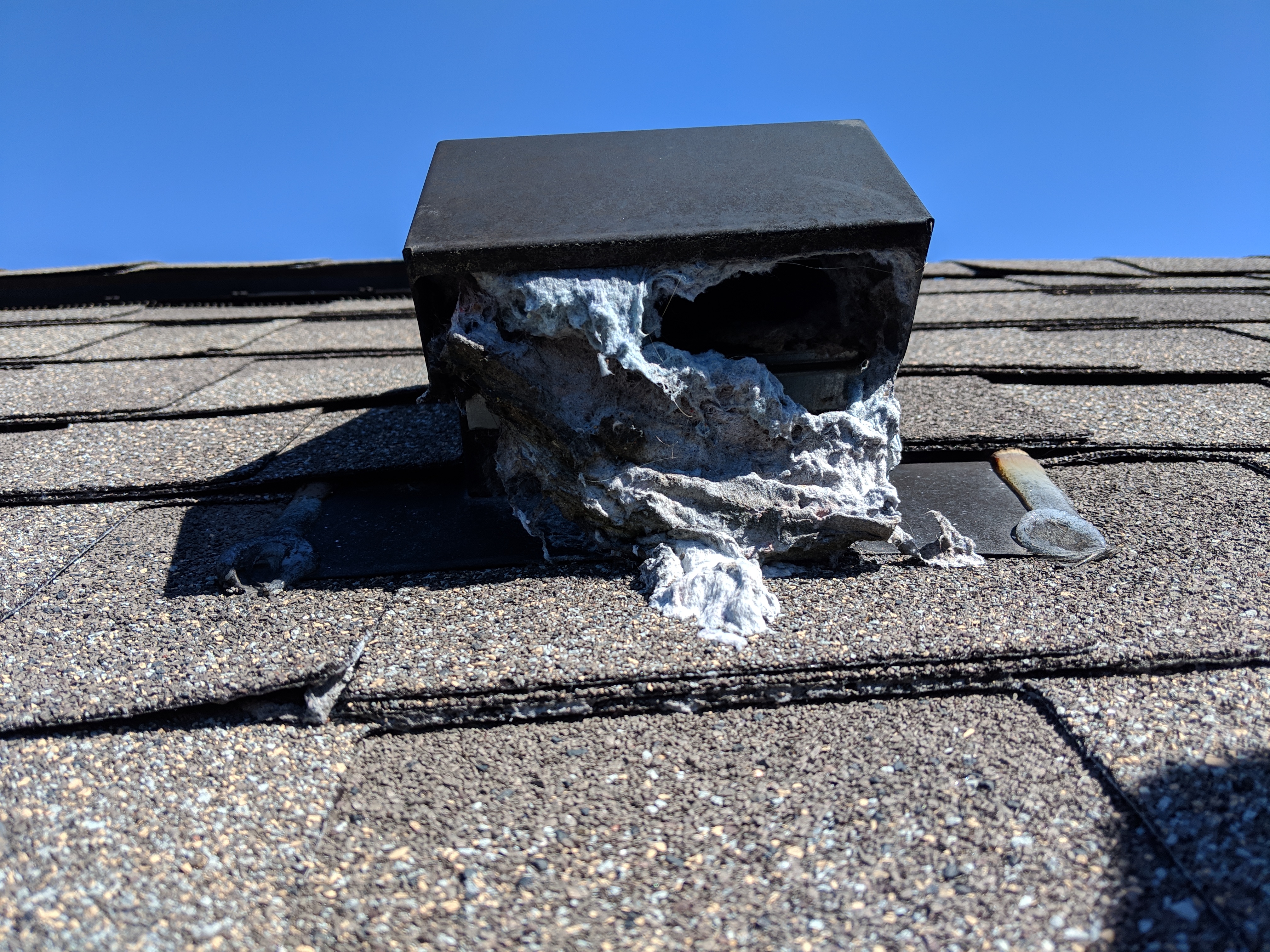Clogged dryer vent roof cap in the Triad NC