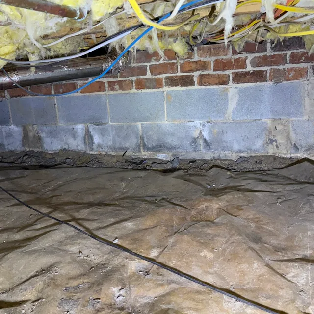 Northern Shores crawlspace after lint cleanup, ready for a new metal dryer vent