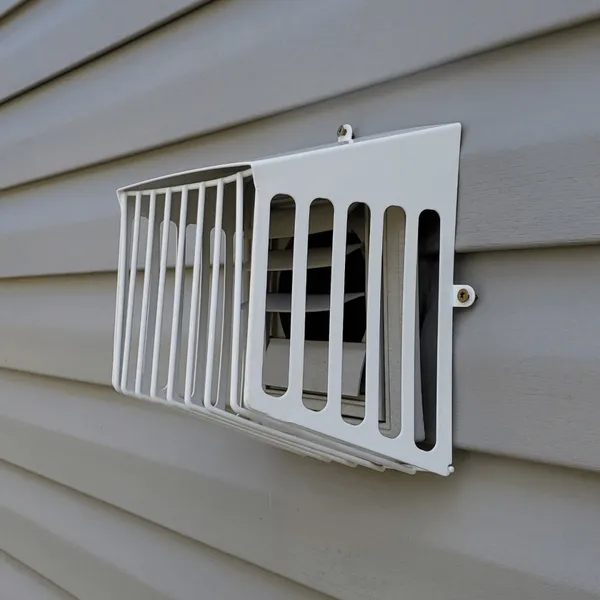 Defender metal bird guard on bathroom exhaust vent prevents future nesting