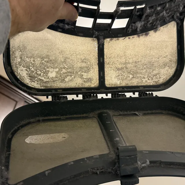 Dirty dryer lint filters restricting airflow in a Reedy Fork Ranch laundry room