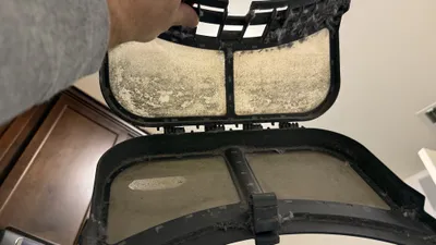Dirty dryer lint filters restricting airflow in a Reedy Fork Ranch laundry room