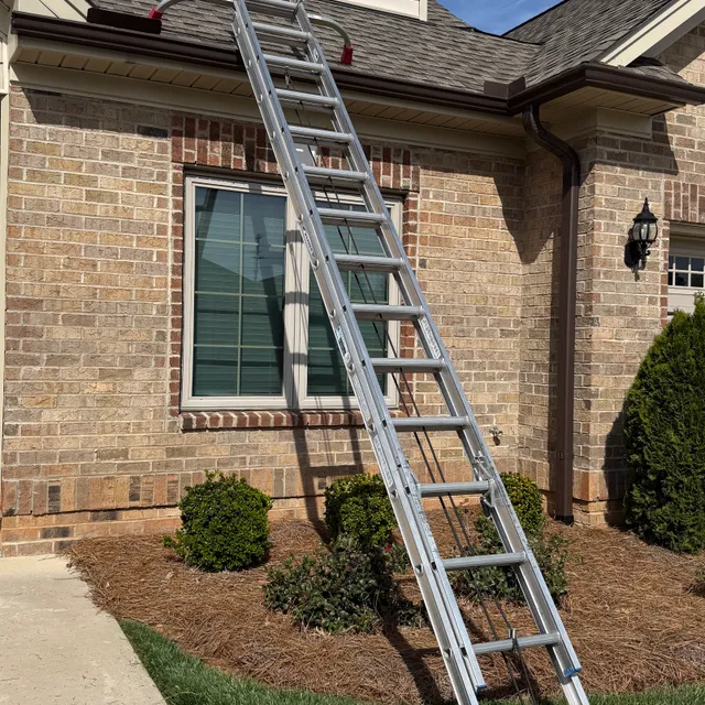 Ladder setup to access roof cover safely at The Trellises