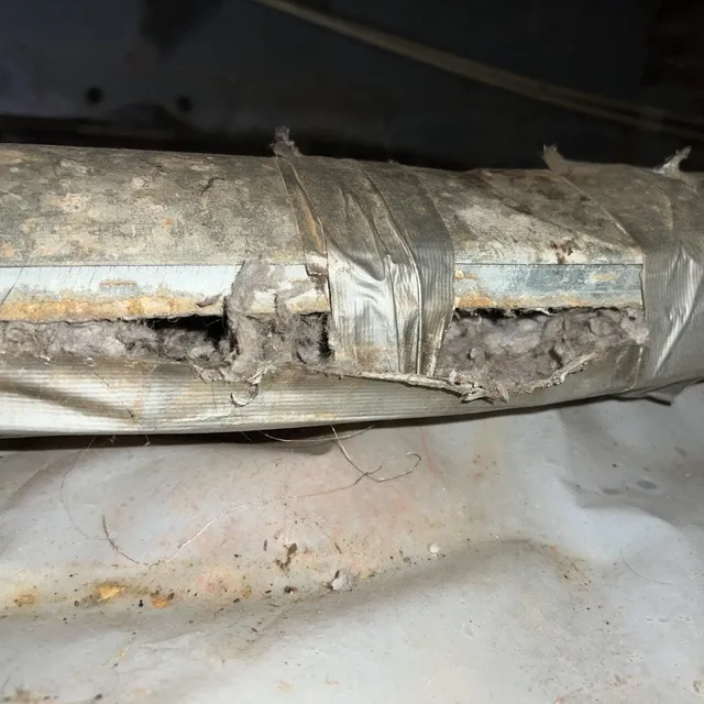 Lame fix on broken dryer vent - popped the seam and a DIY repair