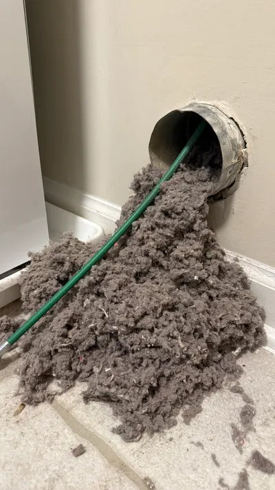 Heavy lint blockage removed during dryer vent cleaning in the Triad NC