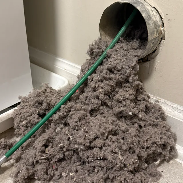 Heavy lint blockage removed during dryer vent cleaning in the Triad NC