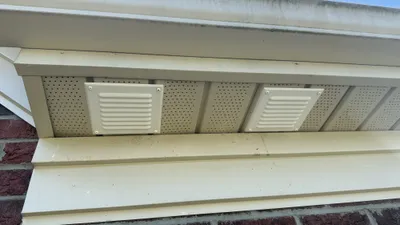 Replacement metal bathroom soffit vent covers with bug shields in Mackintosh on the Lake