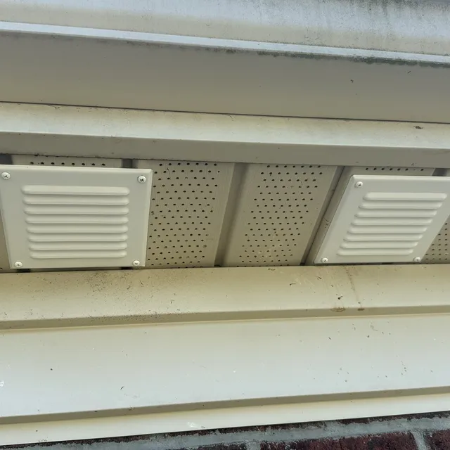 Replacement metal bathroom soffit vent covers with bug shields in Mackintosh on the Lake