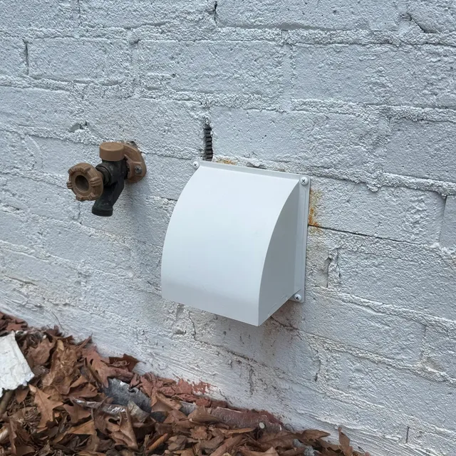 New metal dryer vent cover with painted stainless screws in Old Irving Park
