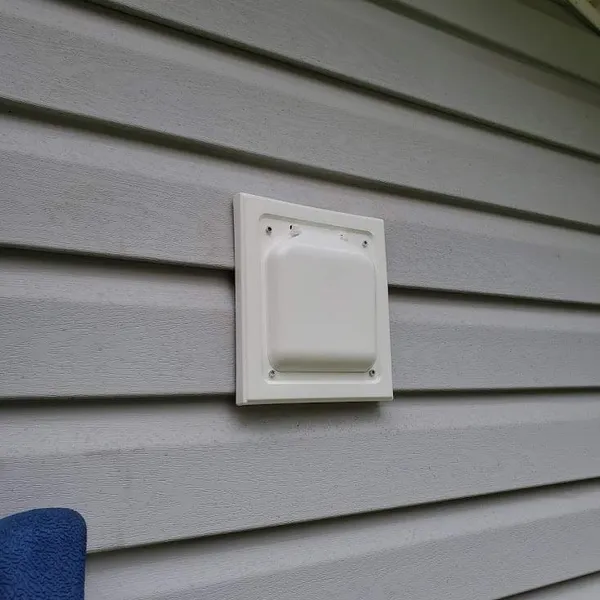 Pest-resistant vent cover on siding