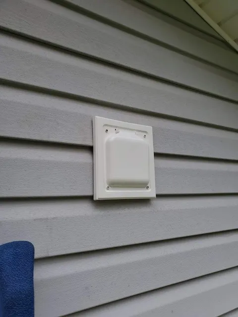 Pest-resistant vent cover on siding