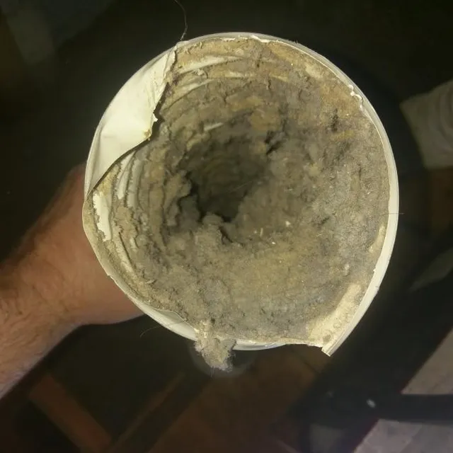 Plastic dryer vent clogged with lint