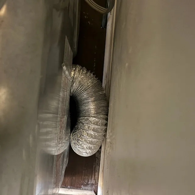 Properly installed dryer transition hose with straight airflow path