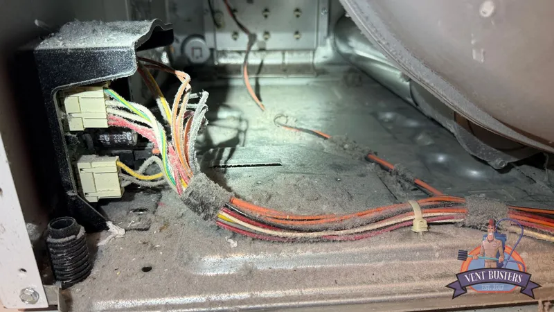 Speed Queen dryers mount their electronics on the base of the machine, where all of the lint builds up