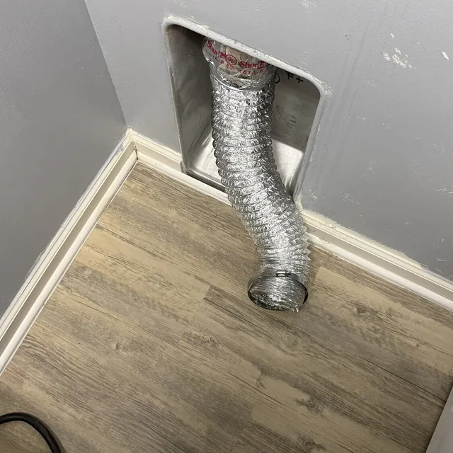 Superflex dryer transition installed in a tight Waterbury laundry room