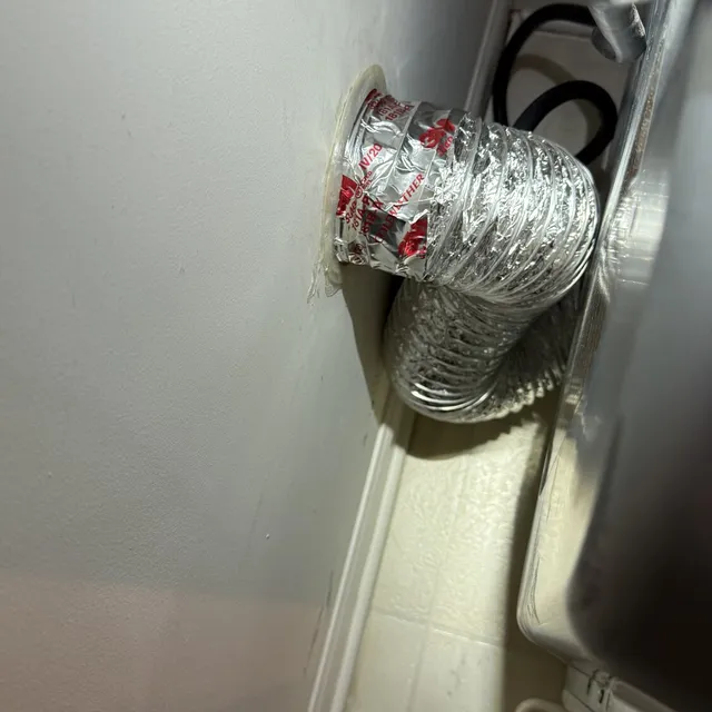 Superflex dryer transition installed in a tight Coble Farm laundry closet