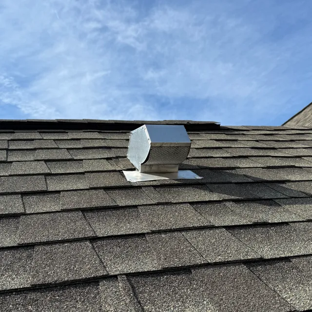 Roof dryer vent cover at The Trellises townhomes