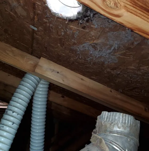 Vent blowing lint into attic before repair