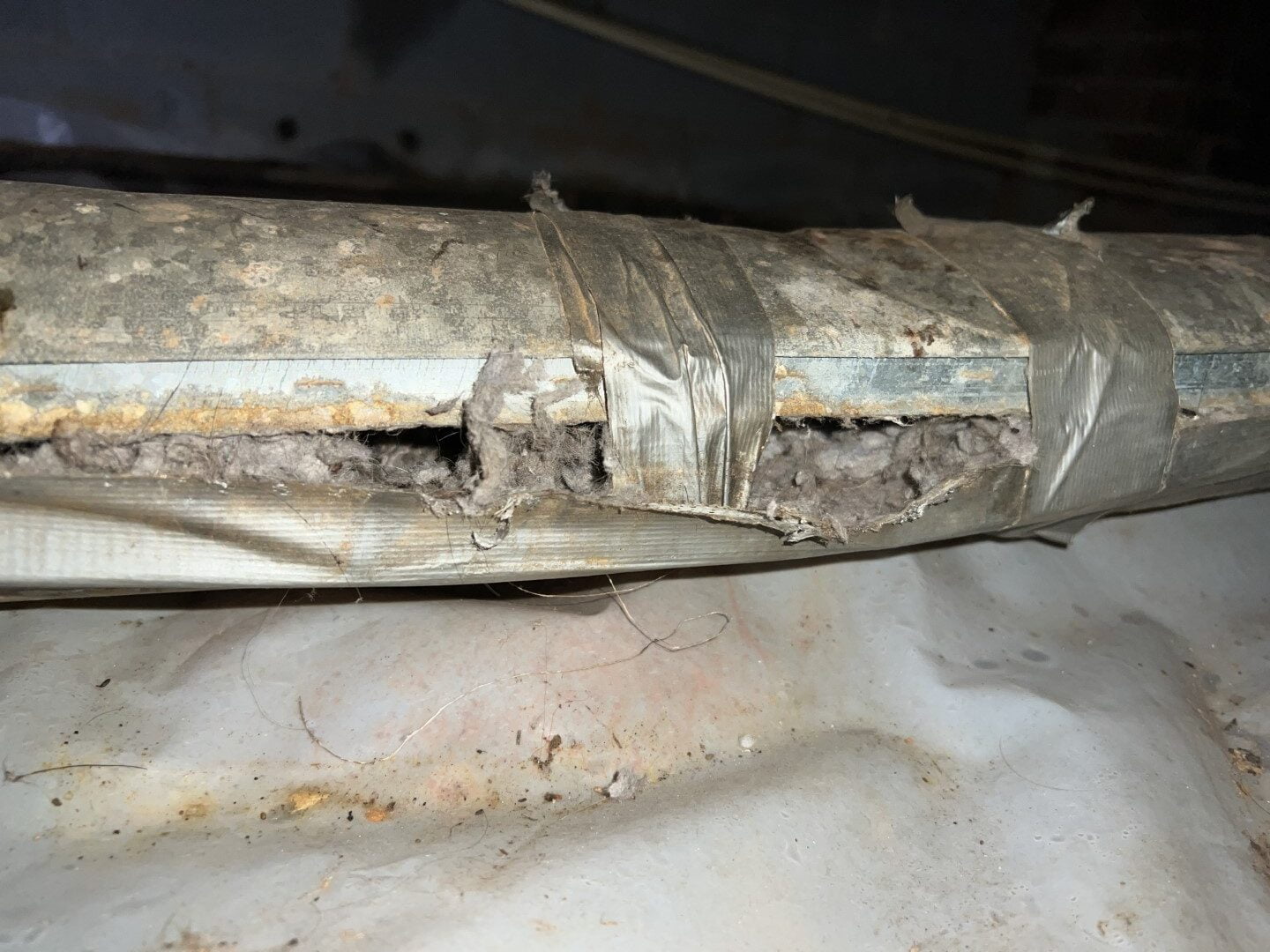 Lame fix on broken dryer vent - popped the seam and a DIY repair