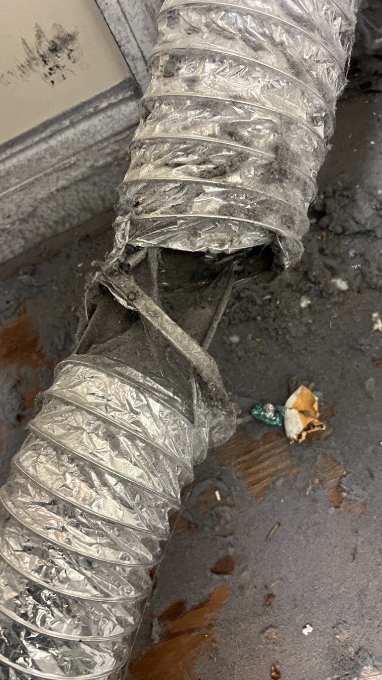 Torn dryer vent hose Whisper Creek